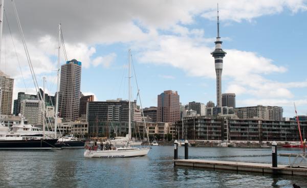Sailboat in Viaduct Harbour in front of Sky Tower