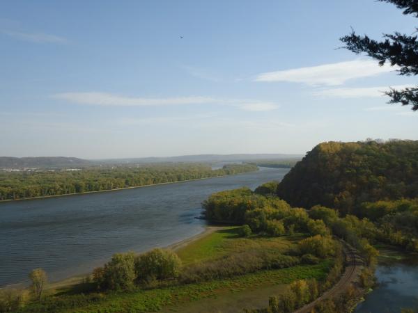 Scenic view of river and hills