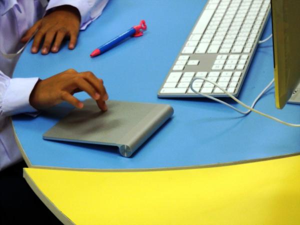 School student using Apple Mac