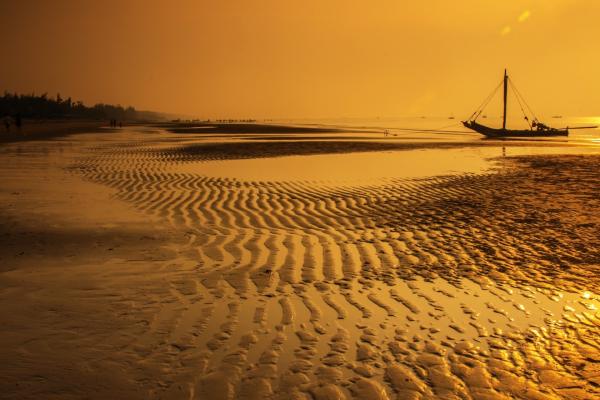 Sea Water With Boat during Sunset