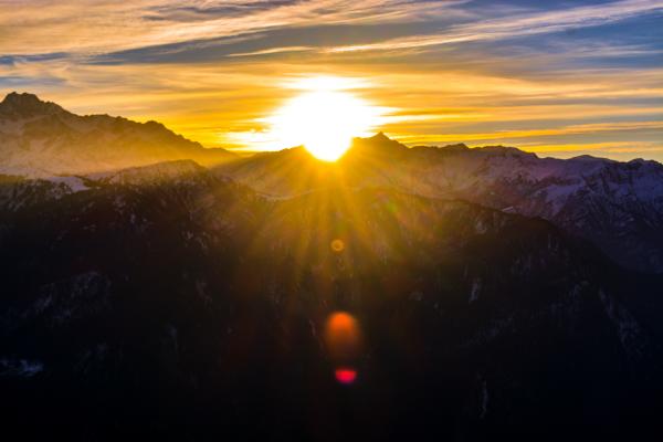 Silhouette of Mountains during Sunrise