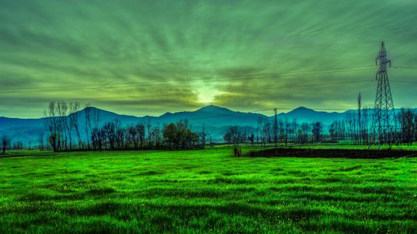 Silhouette Photography of Mountain Near Green Grass