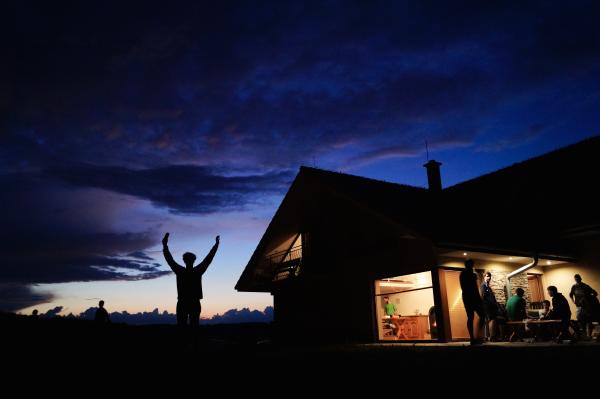 Silhoutte of Person Standing during Night Time