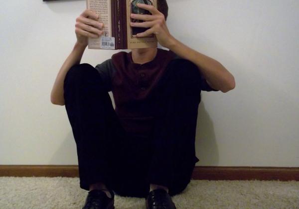 Sitting on floor reading