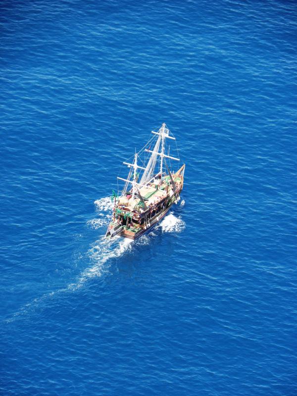 Small ship in the blue waters of Mediter
