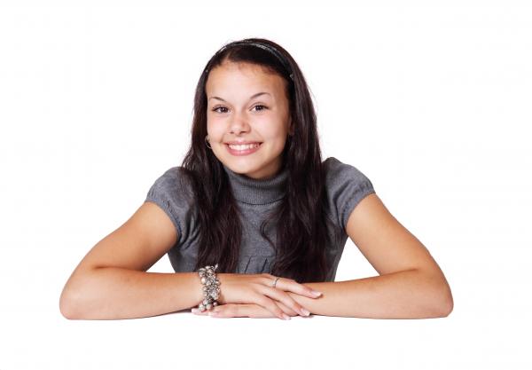 Smiling Brunette Girl in Gray
