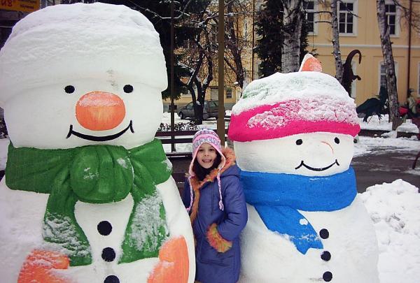 Snowmen and a girl