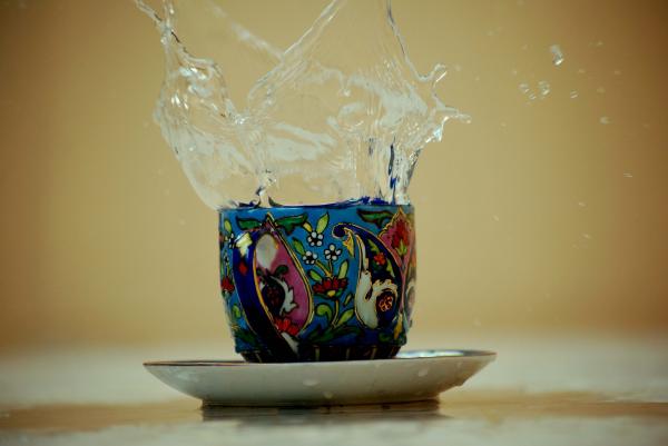 Splashing cup of water