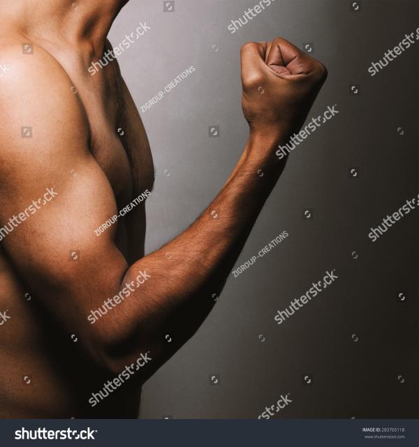 Standing shirtless, closeup