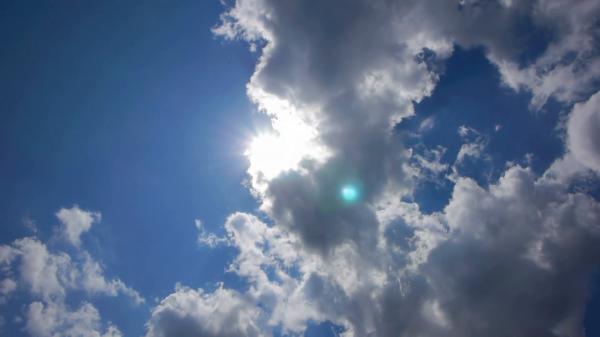 Sun behind clouds