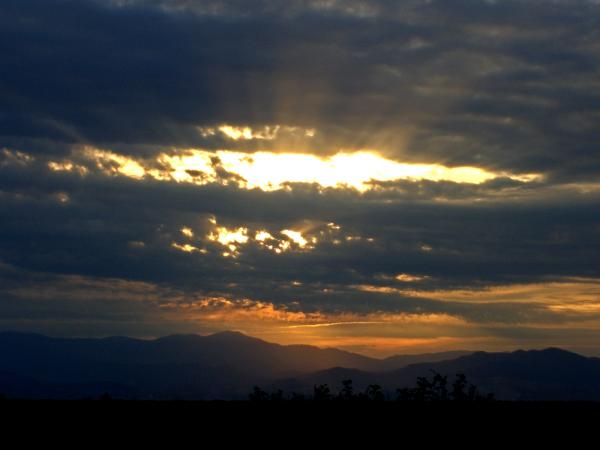 Sun Shining Through Clouds