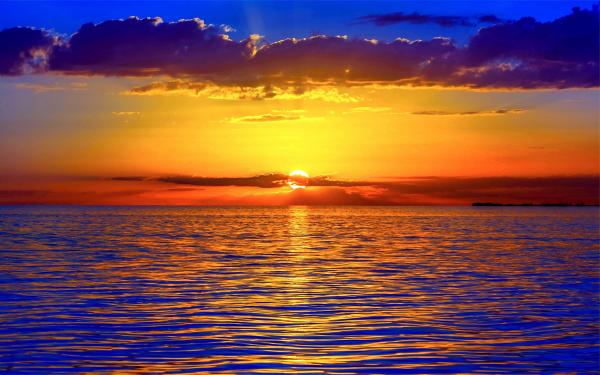 Sunset by the ocean