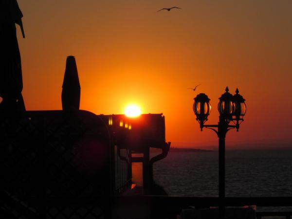 Sunset by the sea