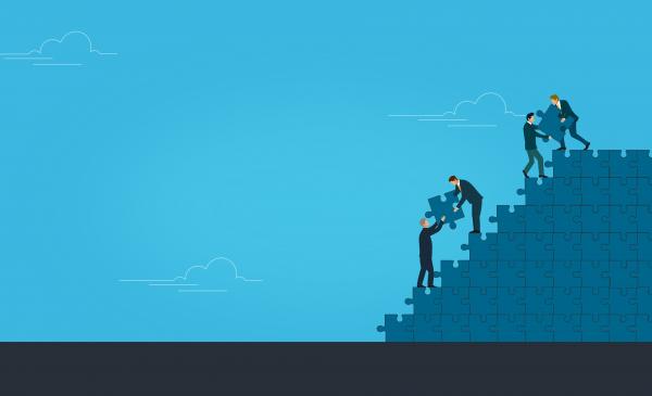 Teamwork Concept - Jigsaw - With Copyspace
