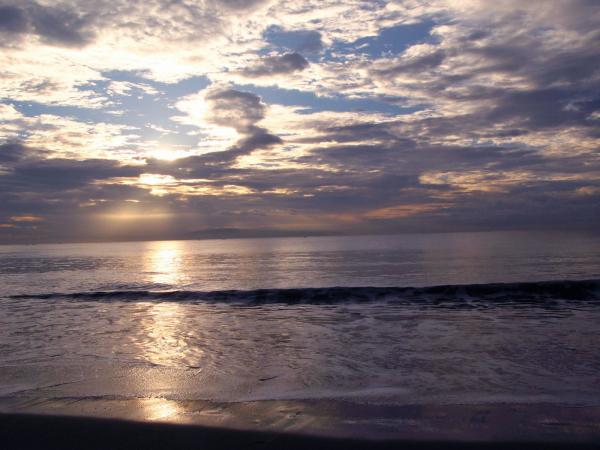 The atmosphere of coastal dunes
