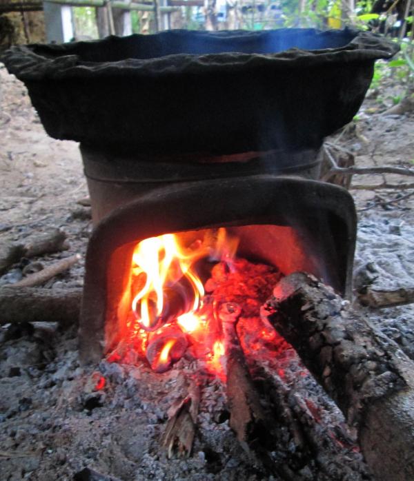 Three burning billets in hot stove