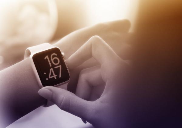 Time to Go - A Woman Checks the Time on Smartwatch