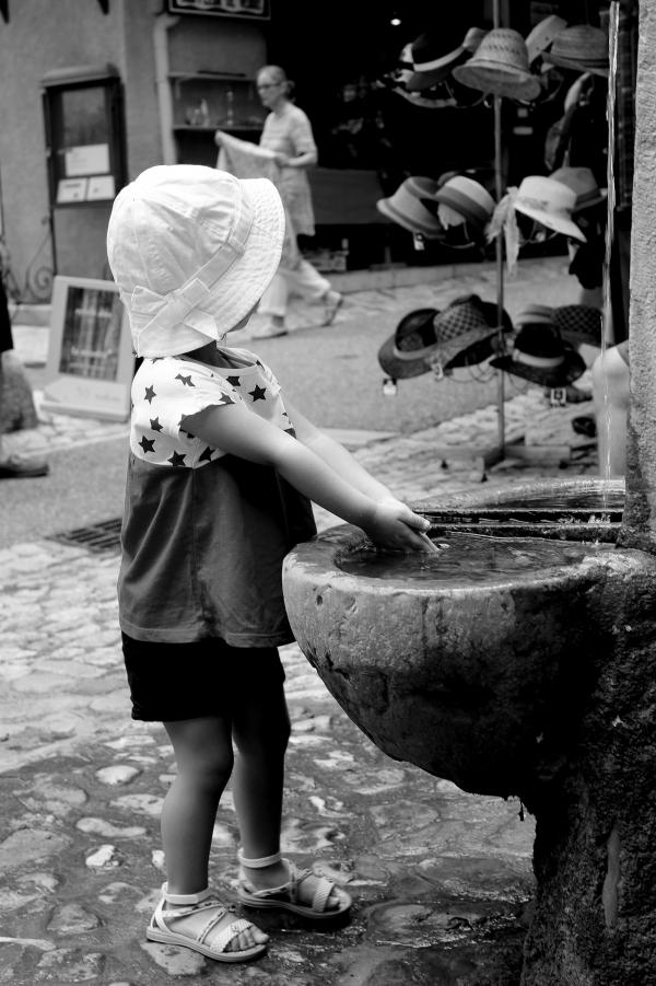 Toddler washing her hands