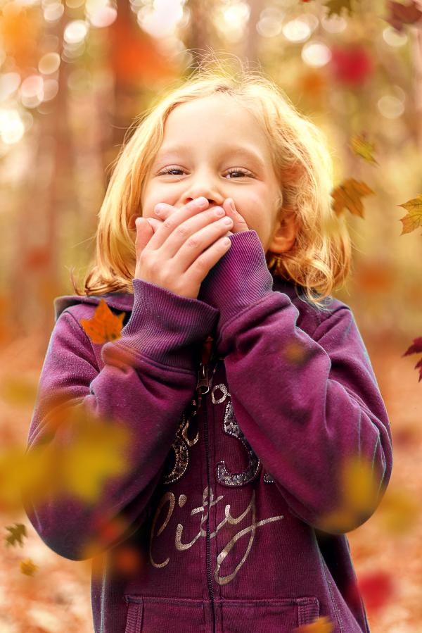Toddler Wearing Purple Sweatshirt