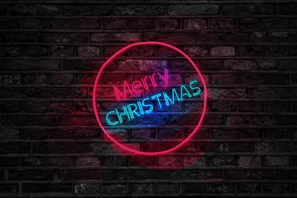 Turned on Red and Blue Merry Christmas Neon Sign
