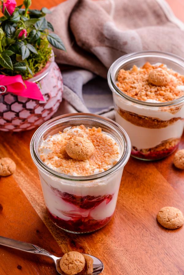 Two Strawberry Soft Served Filled Cups With Cookie Toppings