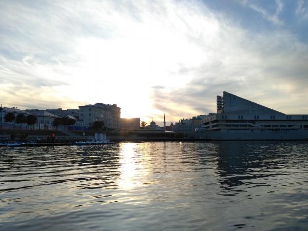 Urban river and sunset