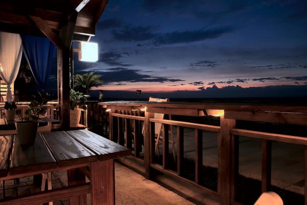 Vacant Tables and Chairs in the Balcony