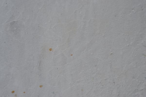 Wall texture with white paint, crack and