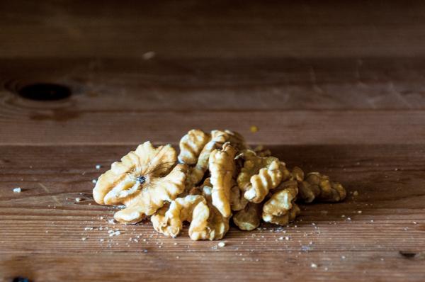 Walnuts on wooden table