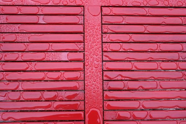 Water on red table