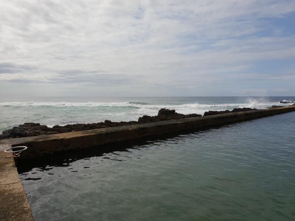 Waves crashing on the bay area