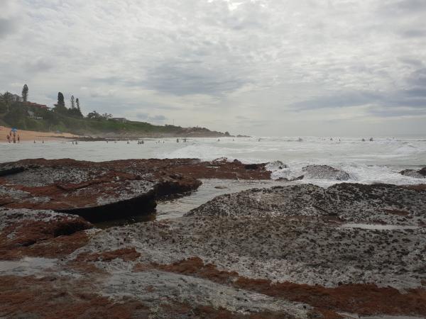 Waves crashing on the rocky beach