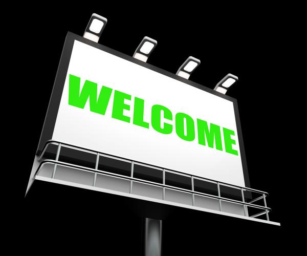 Welcome Sign Shows Hospitality Entrance and Admittance