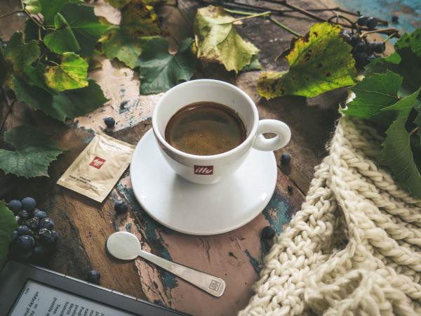White Ceramic Tea Cup With Coffee Inside