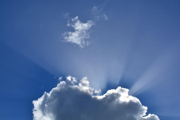 White Cloudy Sky With Sunrays