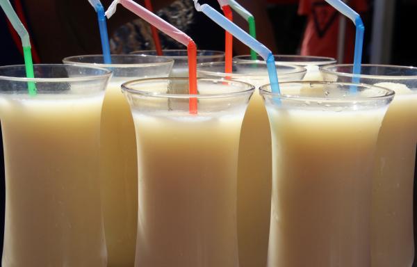 White cocktails with colourful  sticks