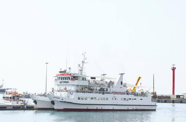 White Commuter Boat on Body of Water