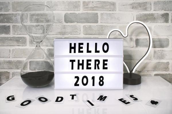 White Hello There 2018 Printed Board Against Gray Wall