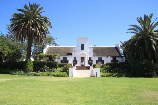 White mansion in the garden
