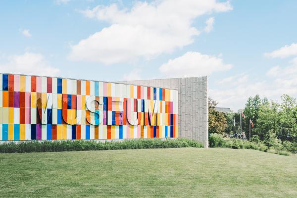 White Red and Blue Museum on Green Grass