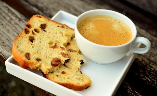 White Tea Cup With Coffee Near Bread on White Ceramic Plate