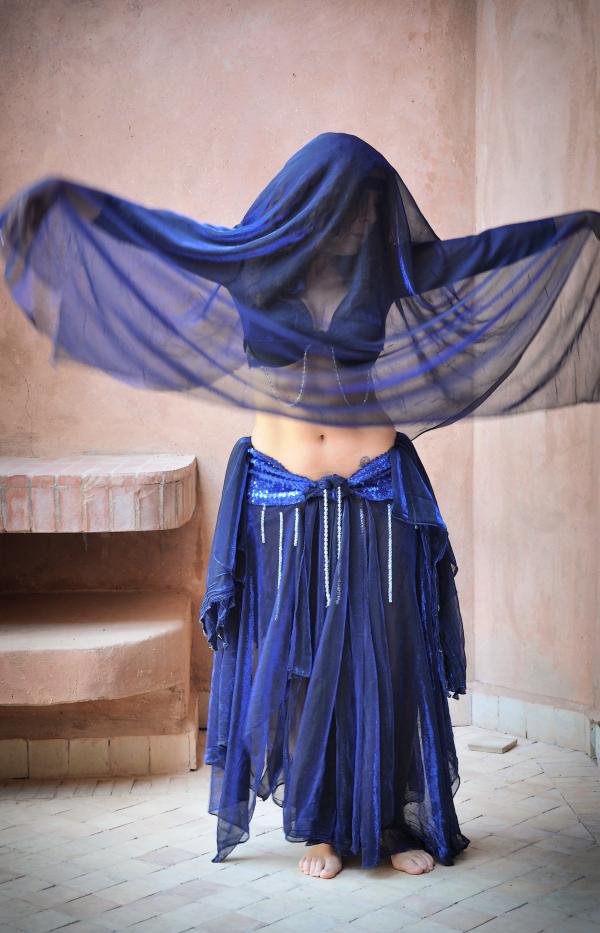 Woman belly dancing