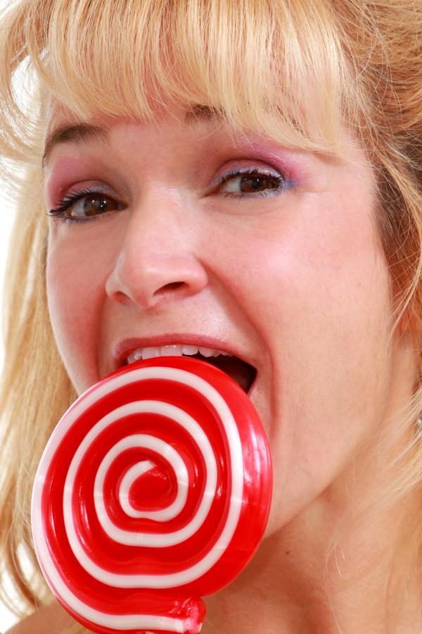 Woman enjoying a lollipop