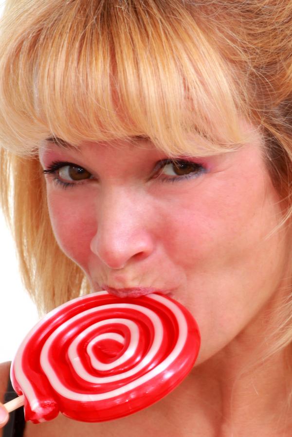 Woman enjoying a lollipop
