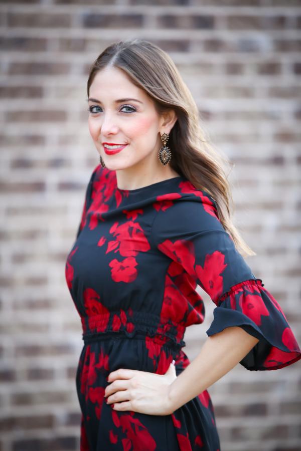 Woman in Black and Red Floral Half-sleeved Dress