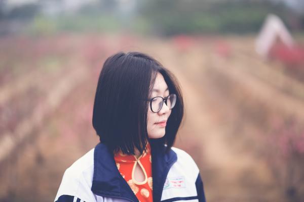 Woman in Black and White Top in Shallow Focus Photography