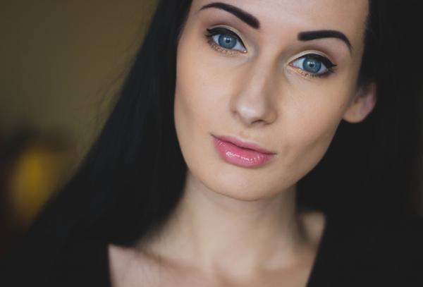 Woman in Black Shirt With Long Hair