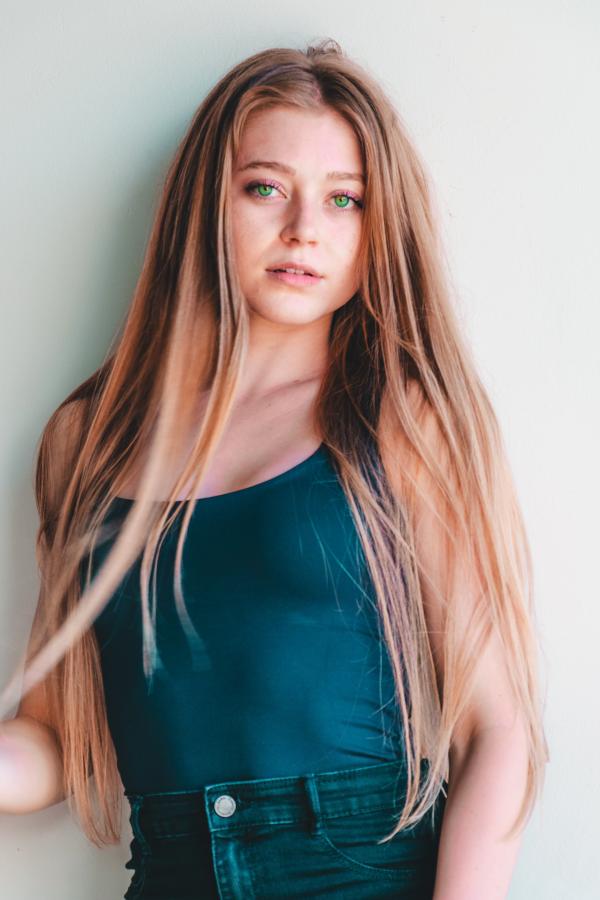 Woman in Blue Tank Top
