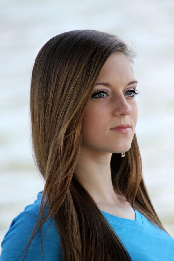 Woman in Blue V Neck Shirt