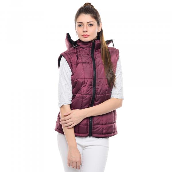 Woman in Pink Zippered Bubble Vest and White Jeans